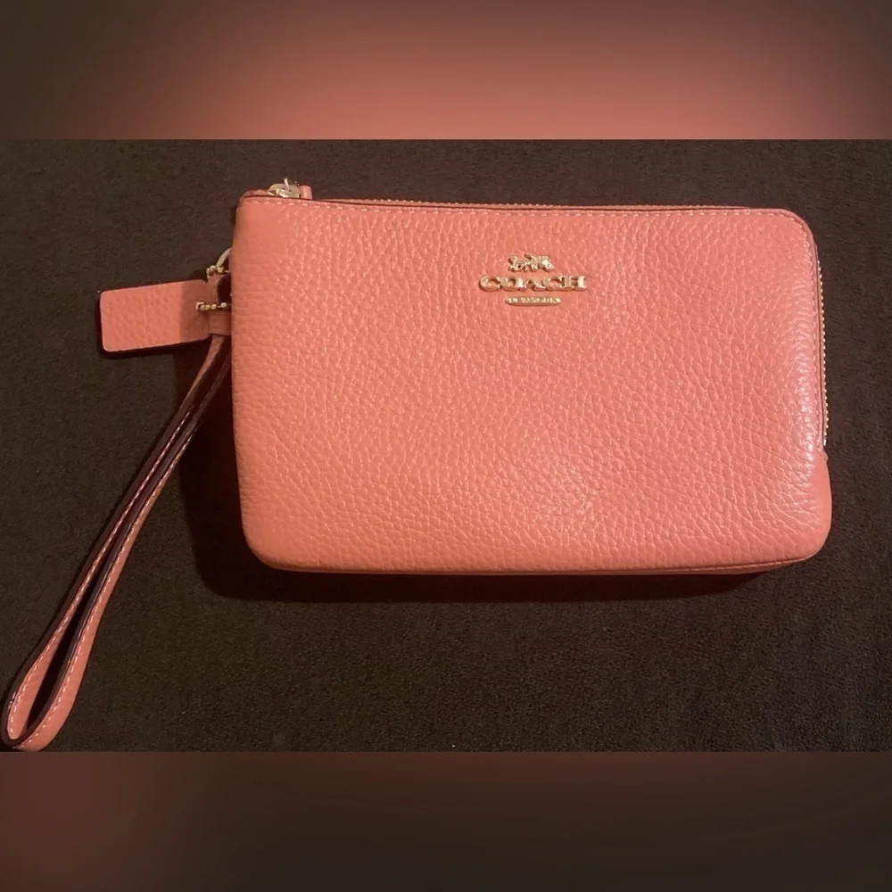 Coach coral pink wristlet